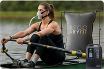 Athletin beim Rudern mit Reco Oxyfit Sauerstoffsystem